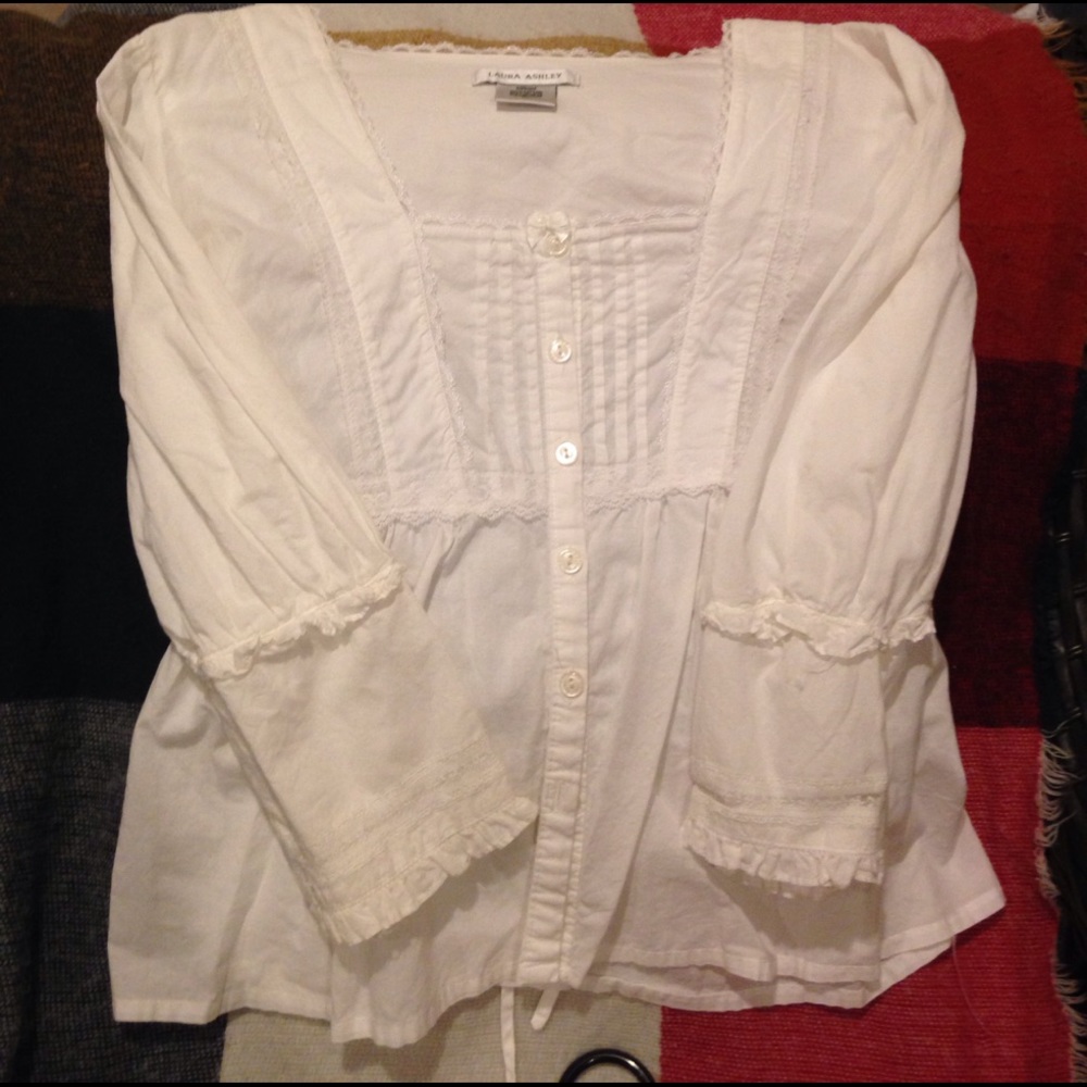 Vintage blouse.White,tie in back.Nice lace detail.