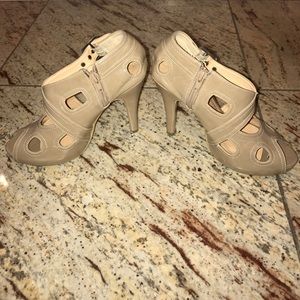 Nude heels with peek-a-boo holes