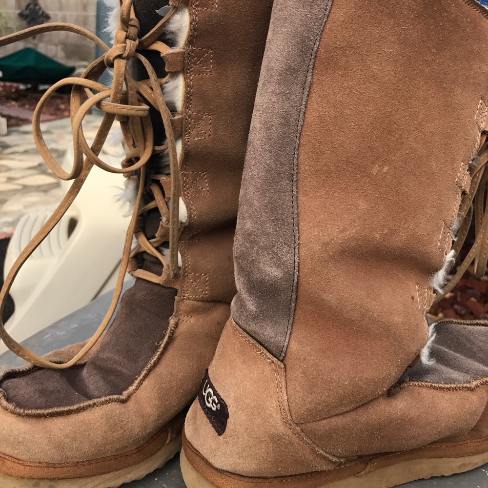 Uggs lace up. Leather and sheep skin. Knee high.