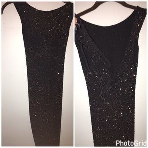 Short black fitted sparkle dress with tie back