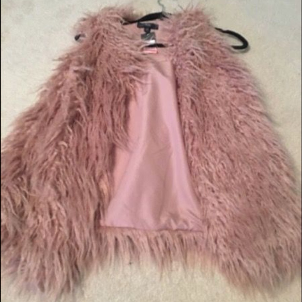 Pink furry vest