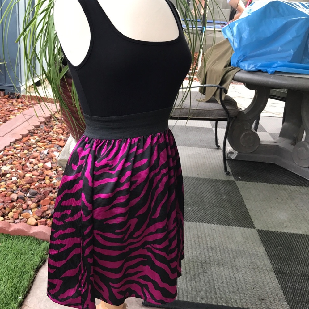 Black and Pink slim fitting Papaya dress.