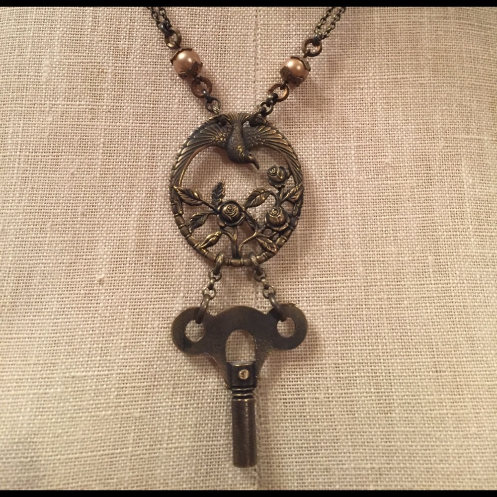 Angel Court bird necklace