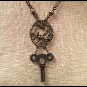 Angel Court bird necklace