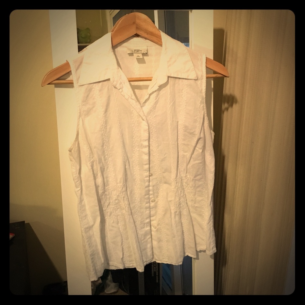 Embroidered sleeveless button up!
