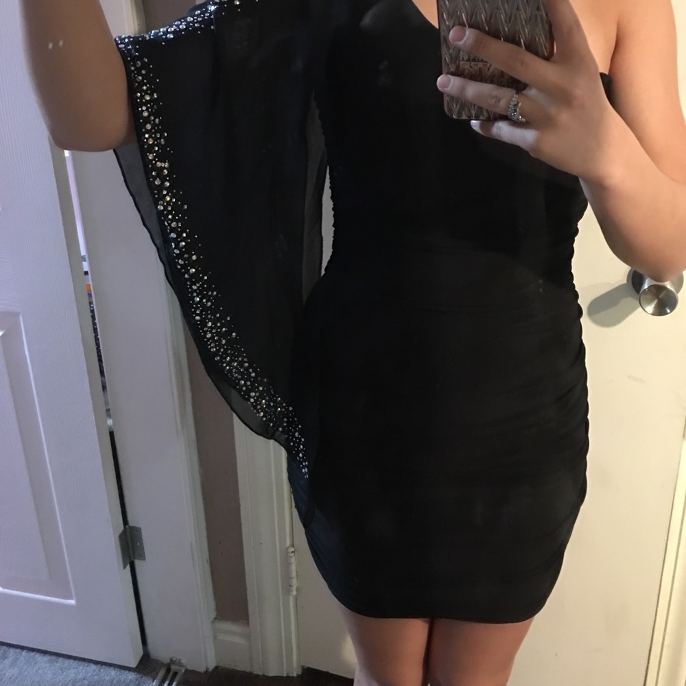 Tight black stoned dress