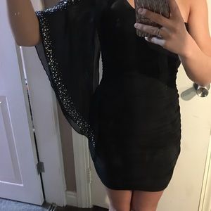 Tight black stoned dress
