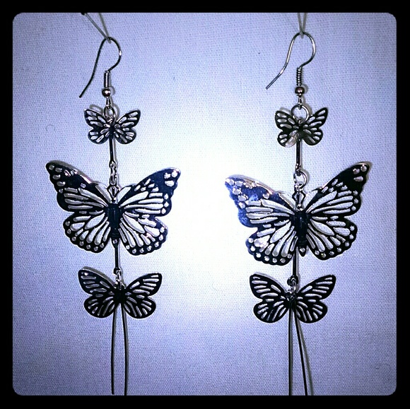 Beautiful silvertone triple butterfly earrings