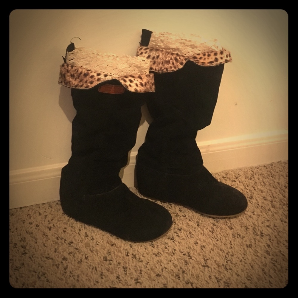 Black below the knee, no heel, flat boots