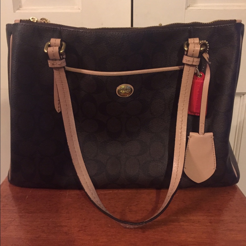 Brown leather signature coach purse
