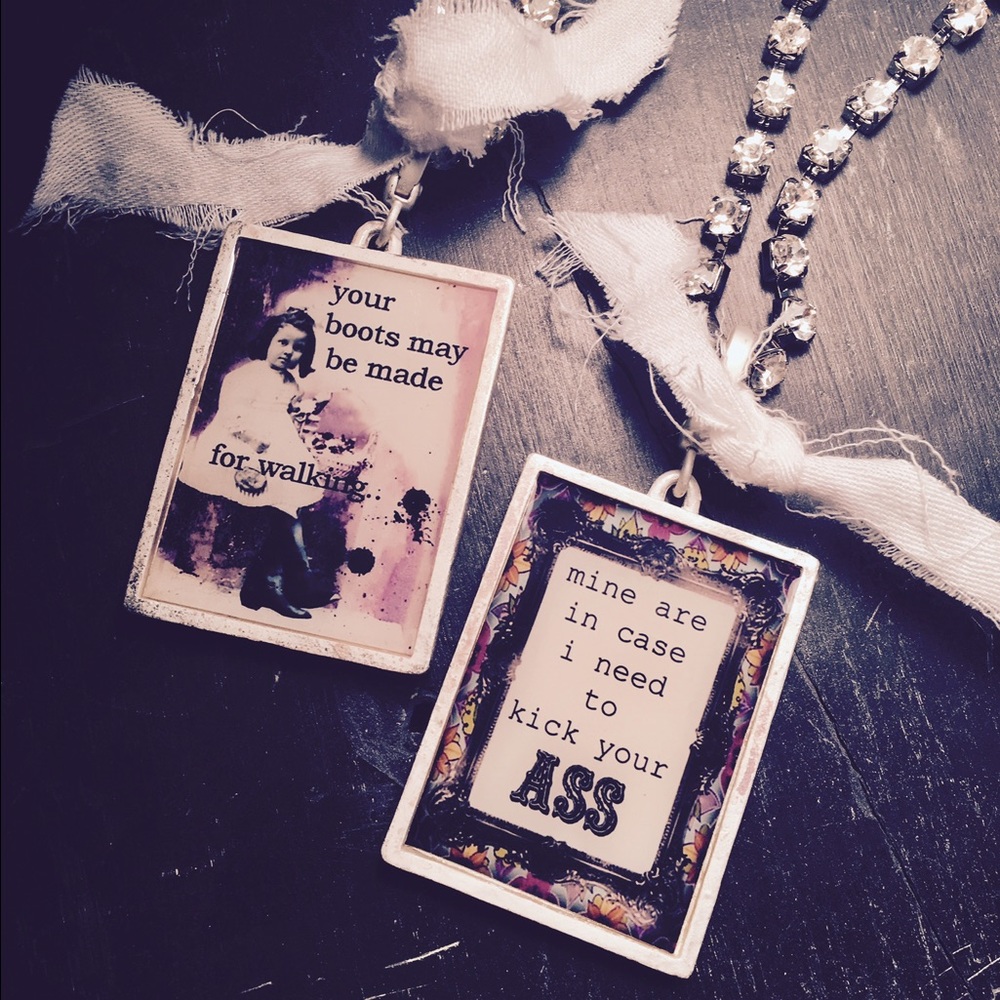 Charm necklace with rhinestone chain & rag bow.