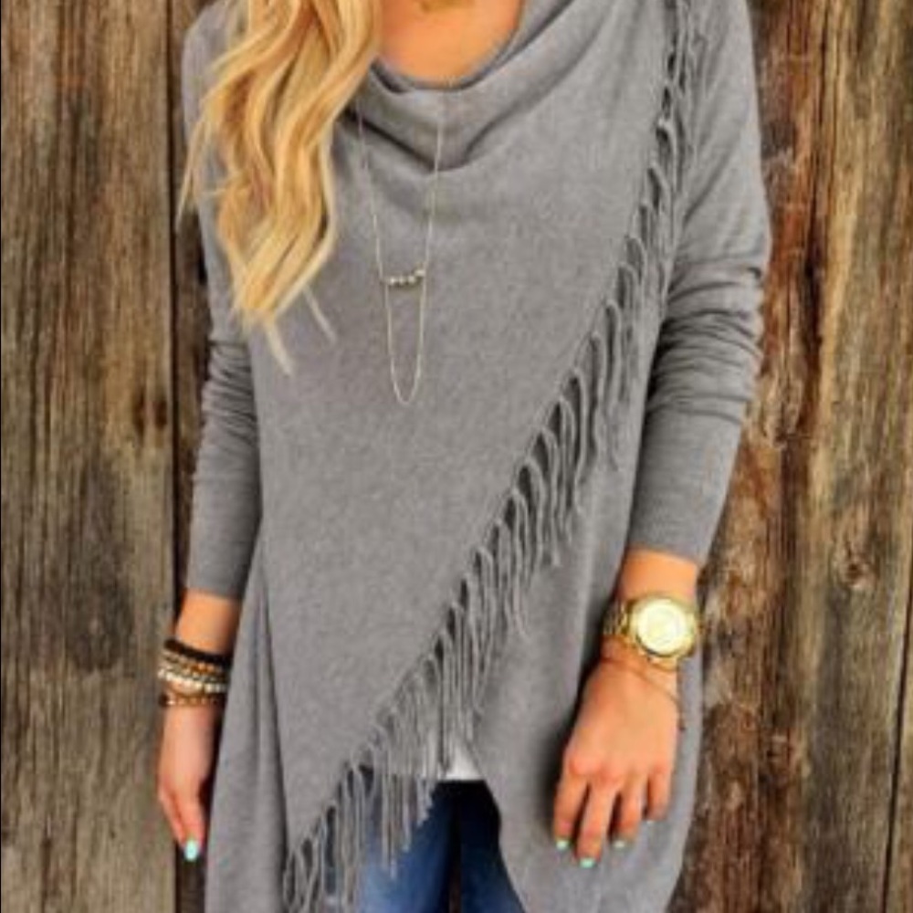 Fringe Cardigan shows L but runs small so M