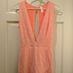 Low Front and Back Orange Romper