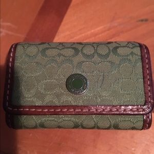 Green Coach contact lenses case