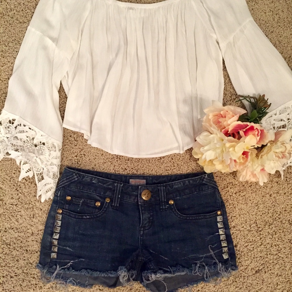 Free People denim shorts with metal accent