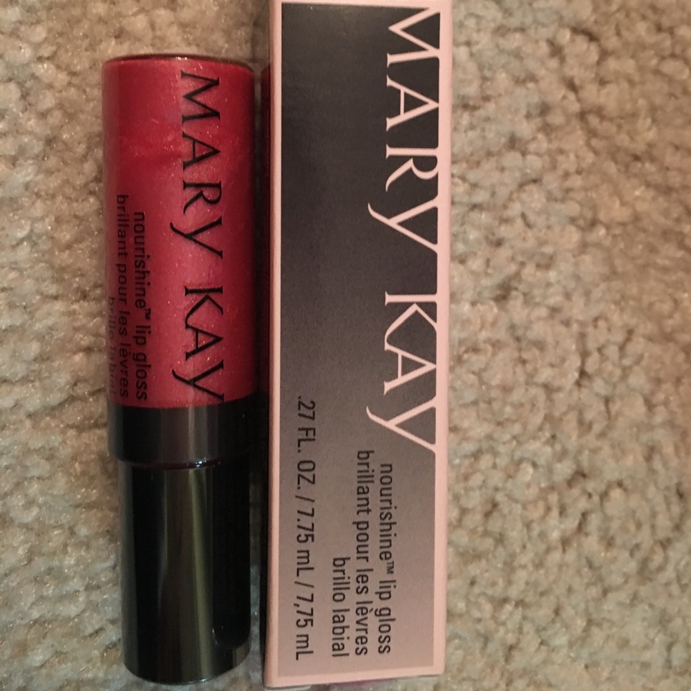 Mary Kay nourishine lip gloss. Coral Rose