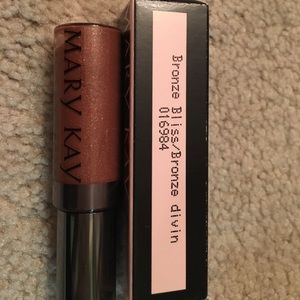 Mary Kay nourishine lip gloss. Bronze Bliss