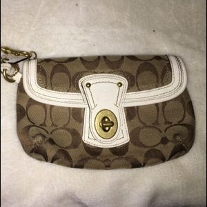 Coach Signature Turn Lock Wristlet