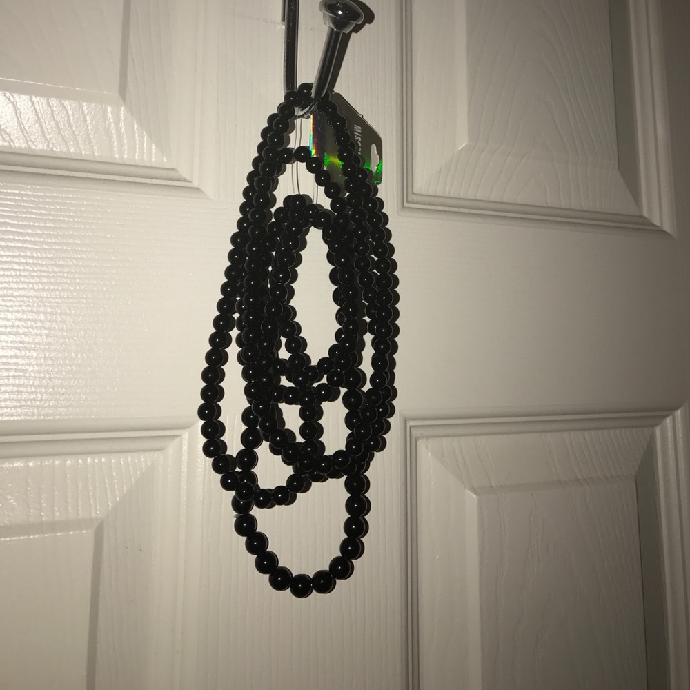 Misguided black layered pearl necklace.