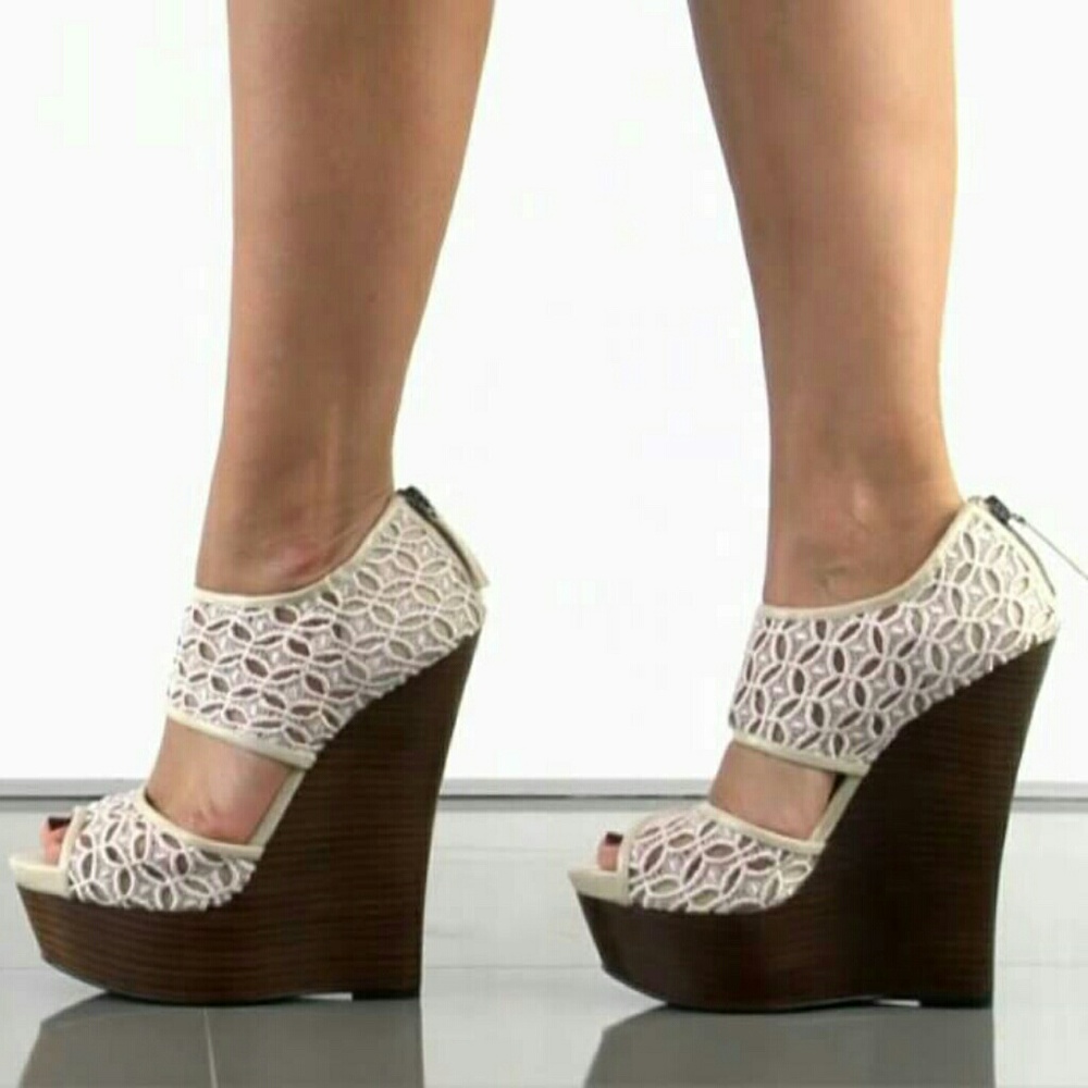 Nude BEBE lace wedges