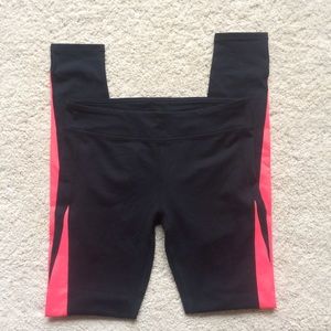 Black and bright pink running leggings