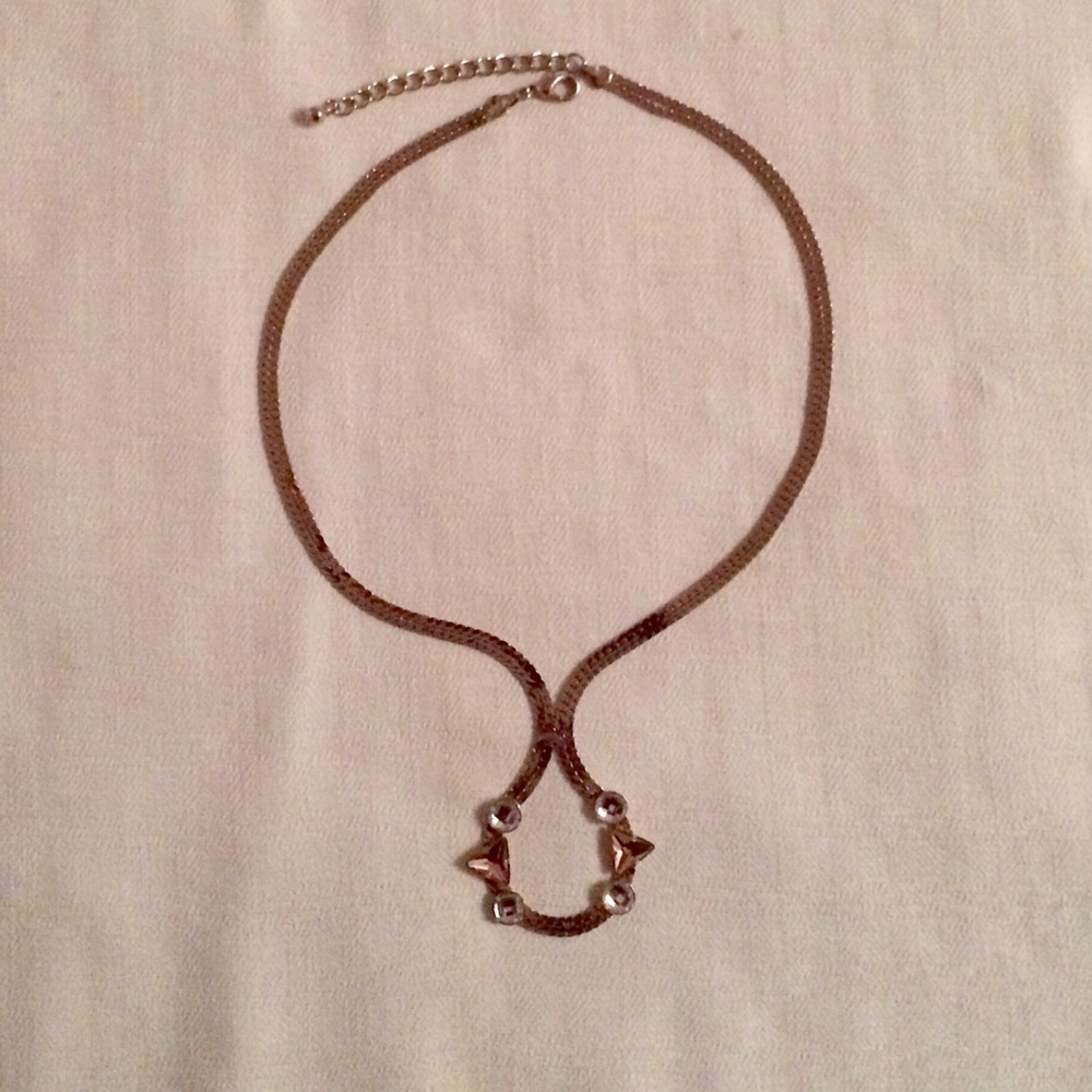 Gold colored necklace. Faux