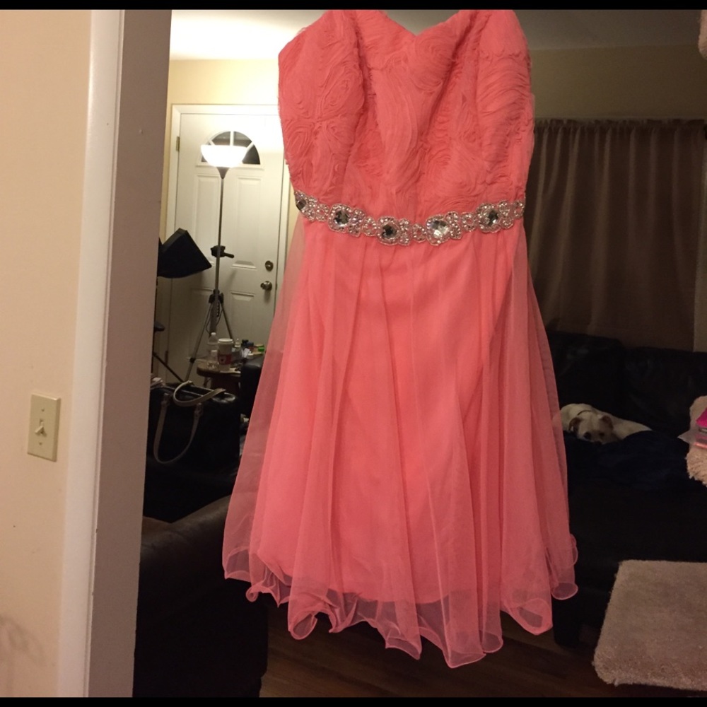 Pink dress with beaded waist.