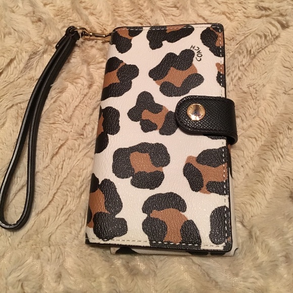 Coach Handbags - Barely used cheetah print Coach wristlet