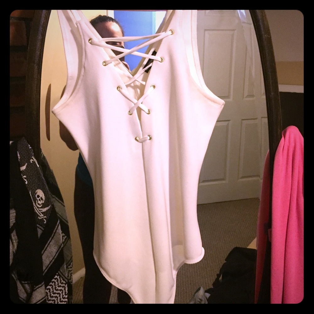 Cream Colored Criss Cross body suit