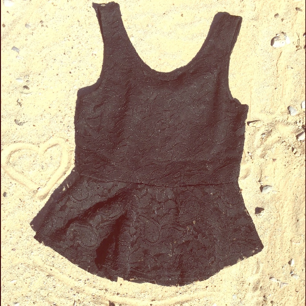 Black peplum lace top with bow back.