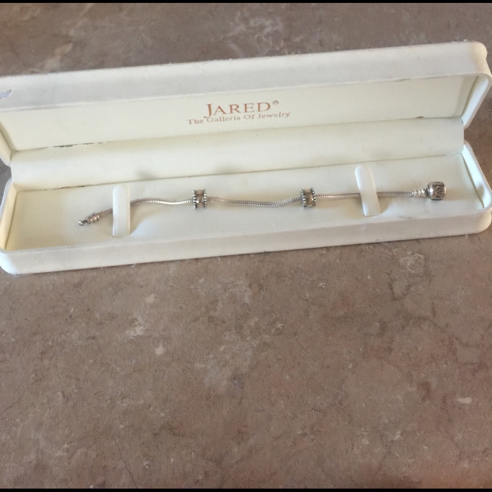 Pandora bracelet with (2) stoppers
