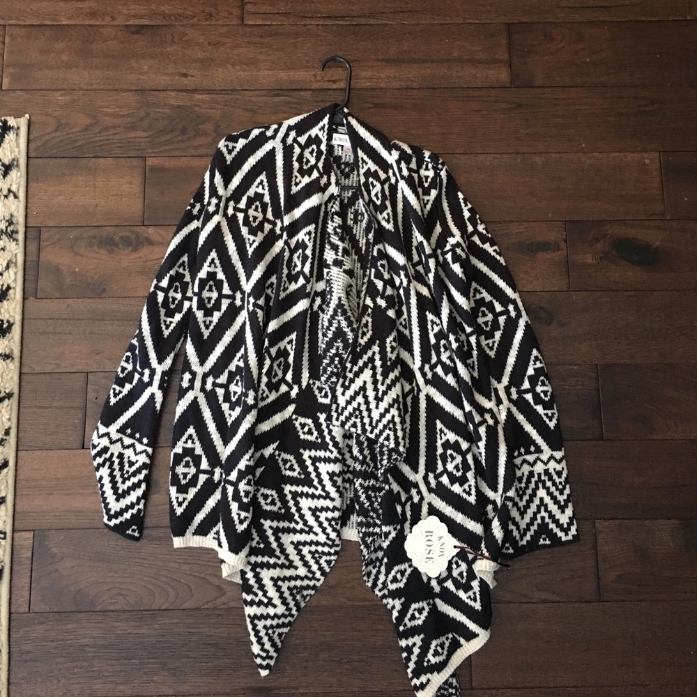 NWT. Cute cardigan. Never found time to wear it!