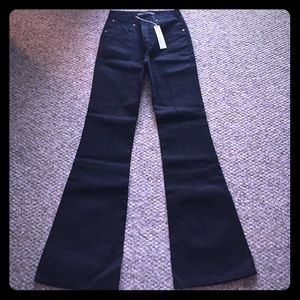 Black flare jeans by Superfine. Size 28.