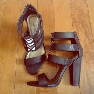 Micheal Antonio cage sandal heel.