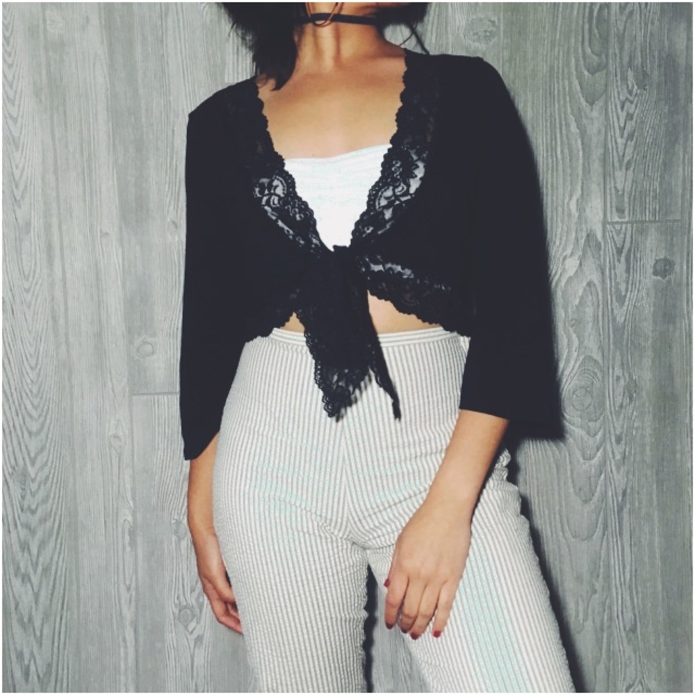 Black knit jersey with lace.