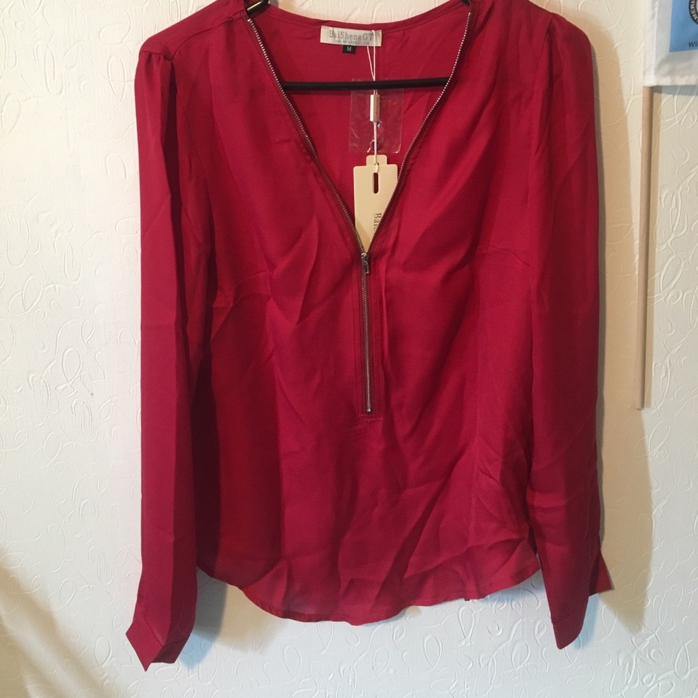 Red blouse with zipper