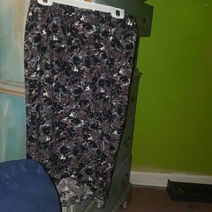 Mid length skirt.. small sexy slit up the back.