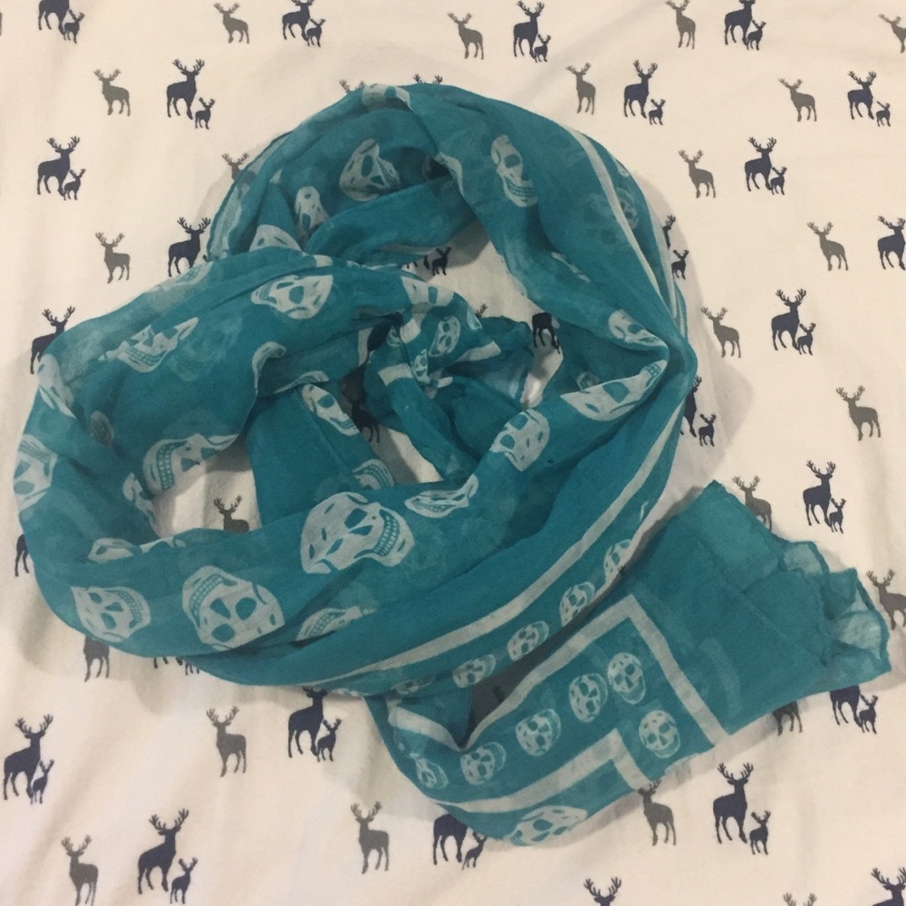 Teal sheer scarf with skull print