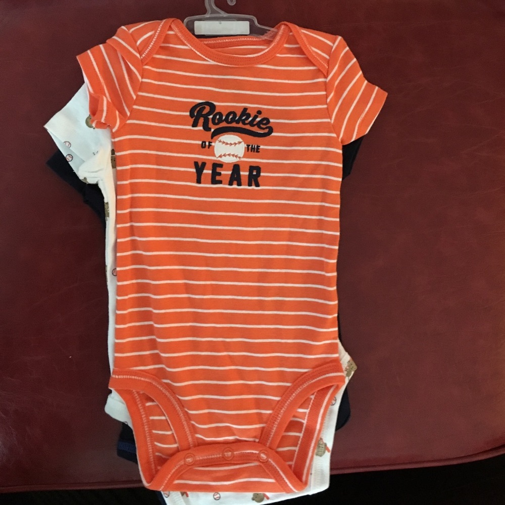 Three onesies new with tags. Size 6 months