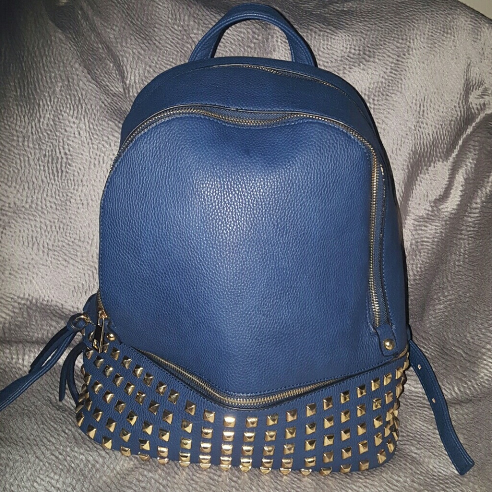 Studded blue leather backpack