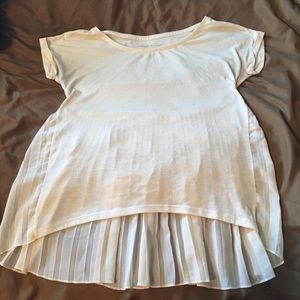 Cream colored pleated short sleeved shirt