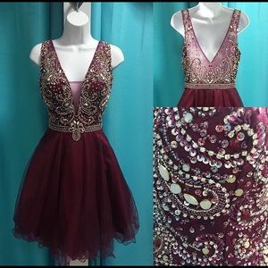 Bedazzled burgundy low cut homecoming dress