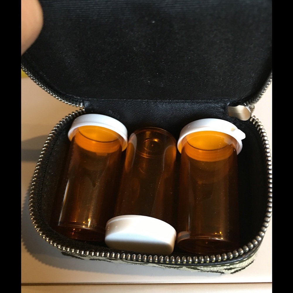 Coach Signature pill case