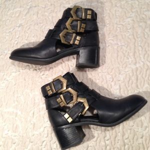 Black ankle booties with adjustable buckles
