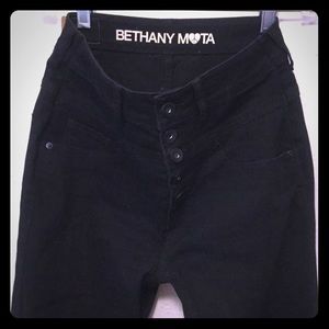 High-waisted black jeans