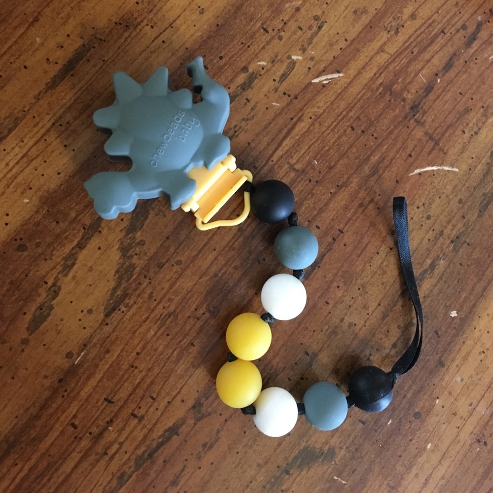 Dinosaur pacifier clip