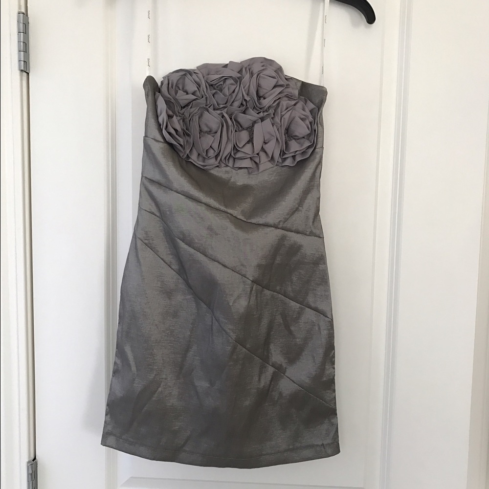 Cocktail dress with rosette bust.
