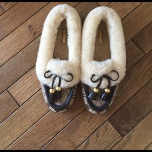 Coach slippers size 6.5.