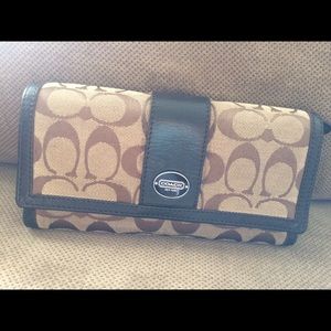 Brown signature coach wallet with checkbook