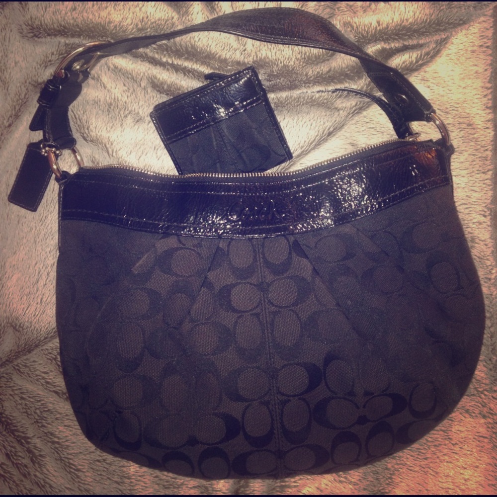 Black leather-lined Coach purse w/ matching wallet